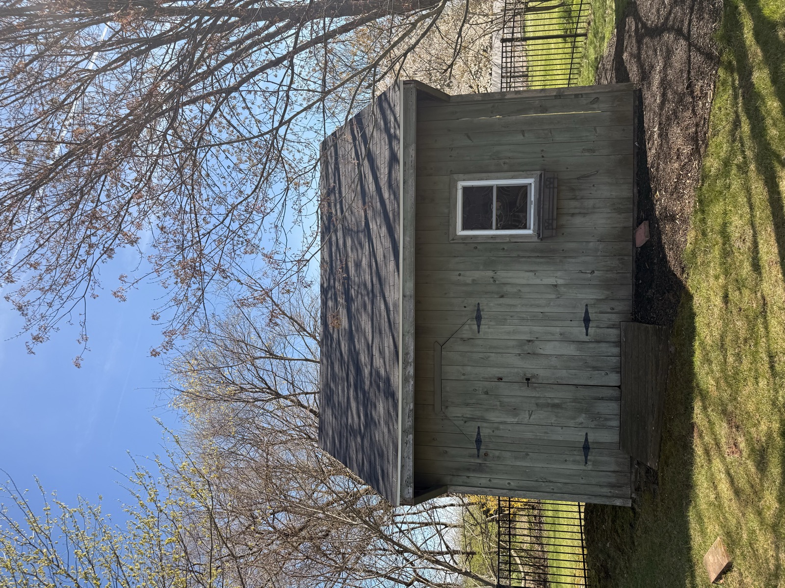 Outbuilding after — refinished siding by GLX Handyman